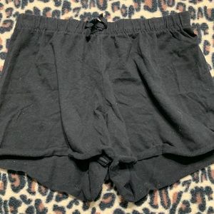 Black shorty shorts.